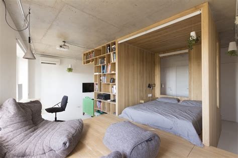 Small Studio Organized Around A Wooden Box Volume