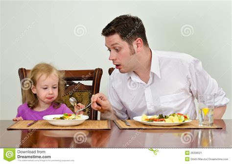 father and daughter having dinner stock image image 26338521