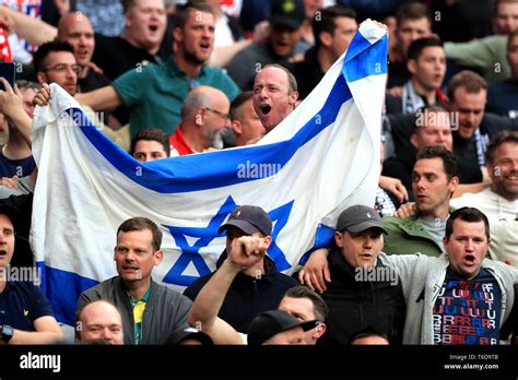 ajax fans hold  res stock photography  images alamy