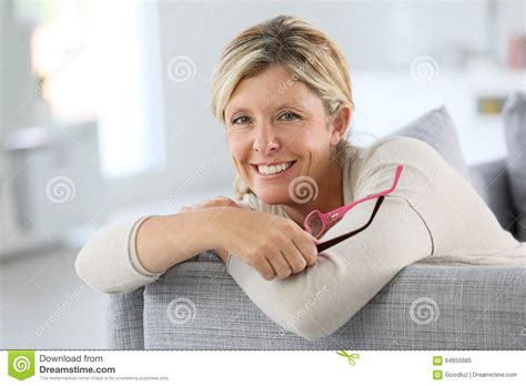 smiling middle aged woman at home stock image image of
