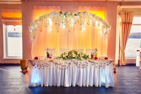 nicely decorated wedding table  groom  bride stock image