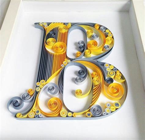 letter      metal  yellow paint   white tray