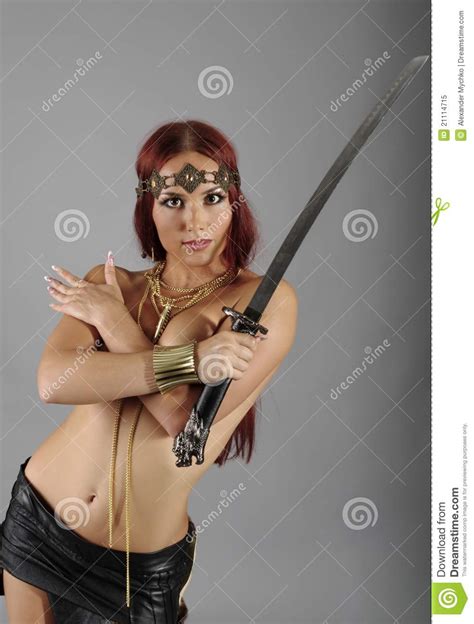 Warrior Woman Holding Sword In Her Hand Stock Image
