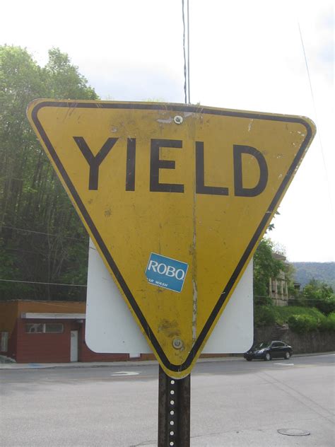 yellow yield sign  artifact      pleasant flickr