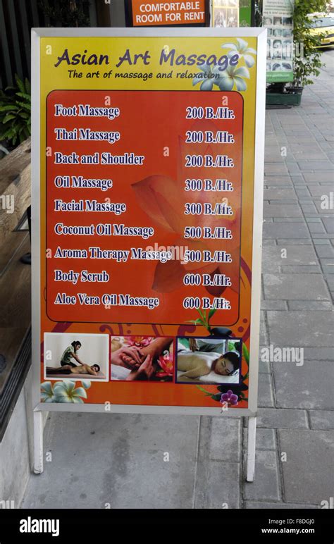 promotional sandwich board offering  massages  pattaya