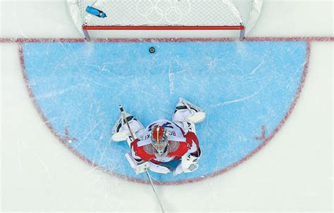 russia s goalie sergei bobrovsky reacts after giving up
