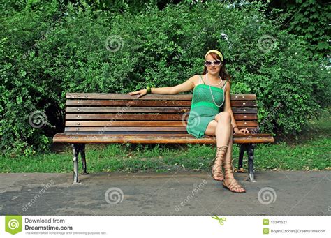 woman sitting alone on bench stock image image of