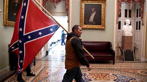 Man Who Carried Confederate Flag In Us Capitol And Son Found Guilty Of