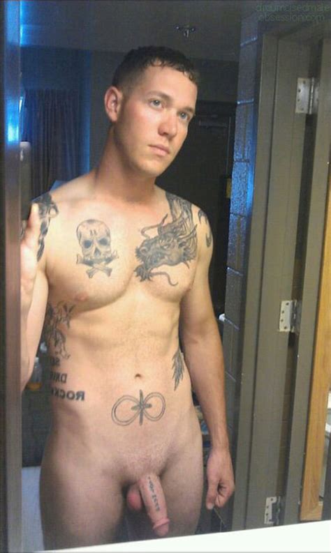 tattooed cute guy showig penis nude men pics