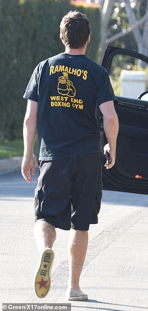 christian bale casual in t shirt and shorts after golden