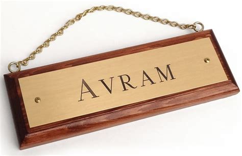 wooden sign   avam hanging   chain