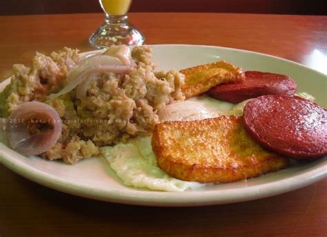 traditional dominican dish known as tripleta mashed plantains mangu with fried cheese eggs