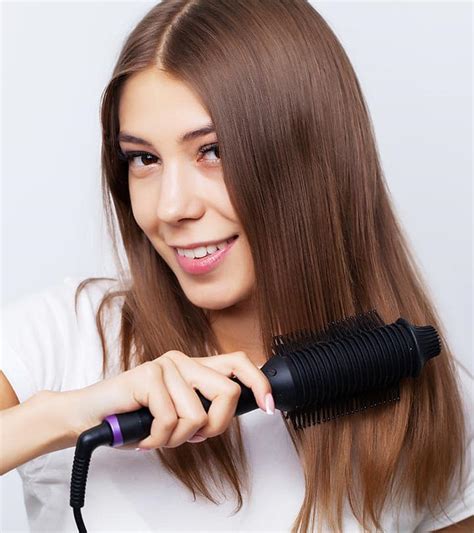 the 12 best hair straightening brushes of 2022 by byrdie hot brush