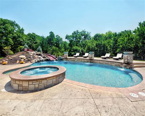 pool  attached hot tub  water feature custom home builders
