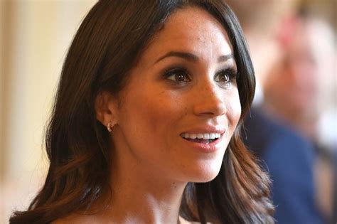 Meghan Markle Wows In Prada On Royal Visit With Prince Harry And The