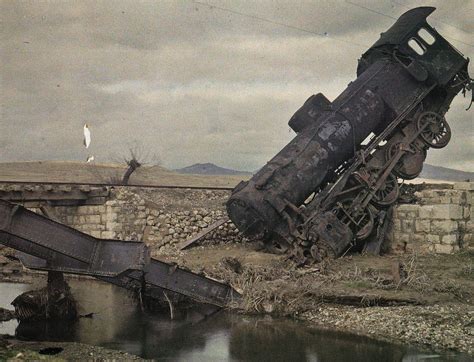destroyed locomotive  railroad bridge   wake   retreat