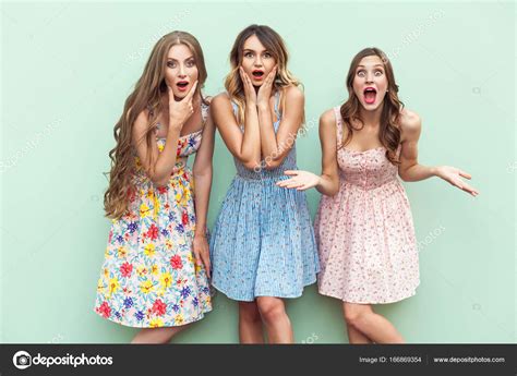 Sexy Long Haired Girls In Dress Looking At Camera With Surprised Face