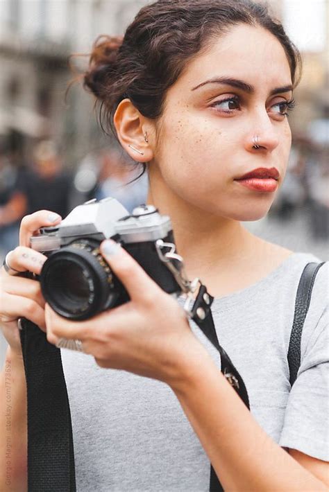 Female Photographer Holding An Old Analog Camera By Stocksy