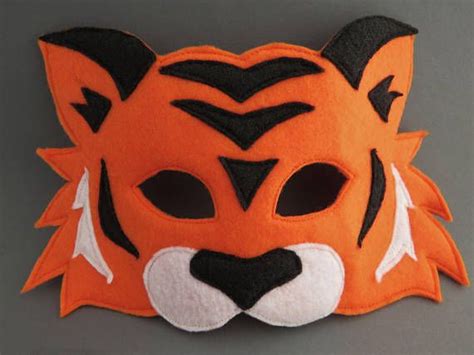 orange  black tiger mask   gray surface   word  love