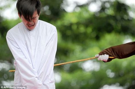 gay men caned 85 times under sharia laws in indonesia