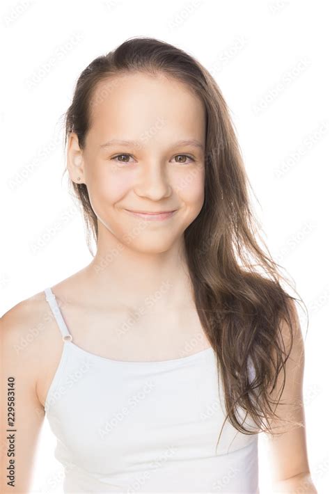Beautiful Smiling Caucasian Preteen Girl In Tank Top With Loose Hair