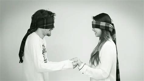 blindfolded strangers kiss in social experiment exploring