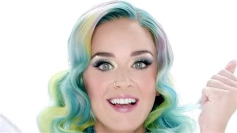 katy perry spreads some holiday cheer in her new campaign for handm