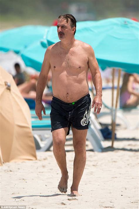 chris noth goes shirtless for ocean swim while on holiday in miami