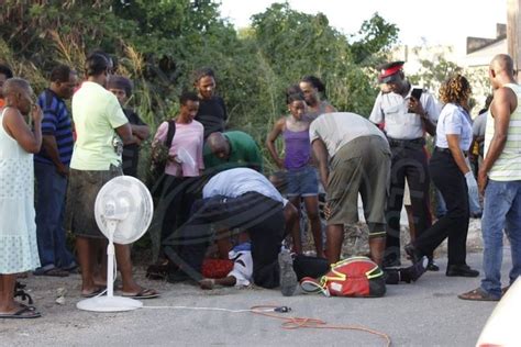 Police And Emergency Officials On Accident Scene In St Lucy Barbados