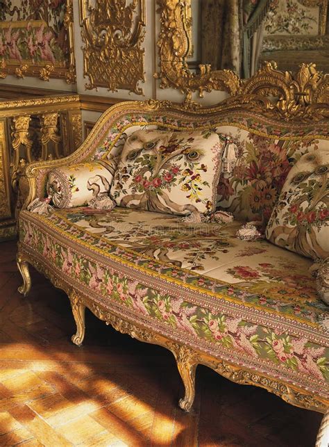 furniture in queen marie antoinette bedroom at versailles palace