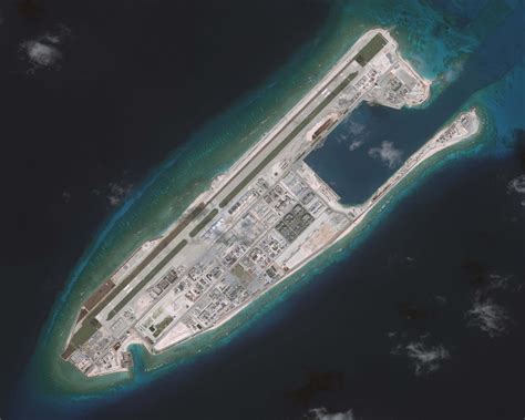 china   began arming  man  islands   south china sea