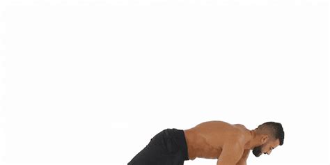 How To Do The Dumbbell Pushup Position Crawl Men S Health