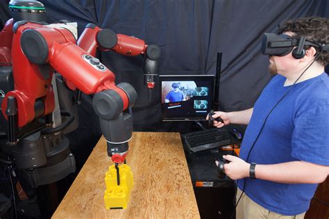 Teleoperating Robots With Virtual Reality Mit News Massachusetts