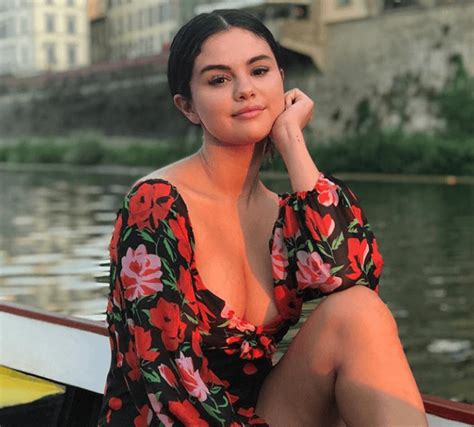 selena gomez sizzles in a backless dress on the sets of her new music video