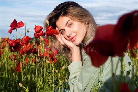 Beautiful Young Woman In Poppy Field Woman On Flowering Poppy Field
