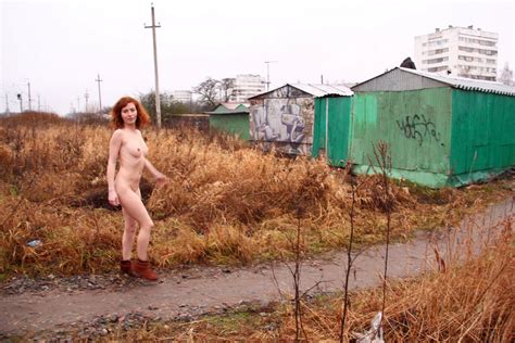 russian redhead posing naked on railway russian sexy girls