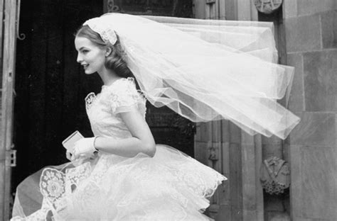 why do brides wear veils on their wedding day and what do they mean