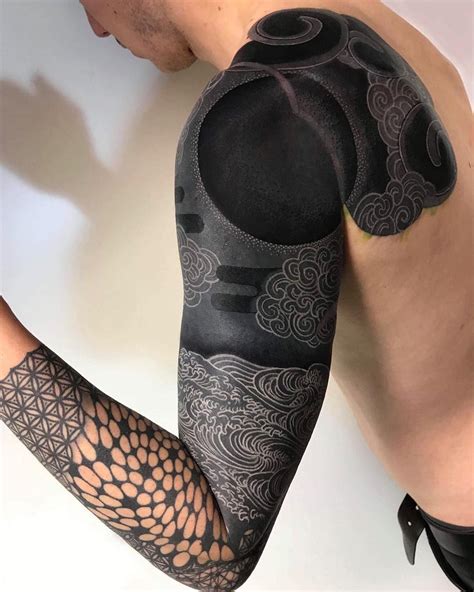 awesome blackout tattoo ideas  tattoo artist nissaco black