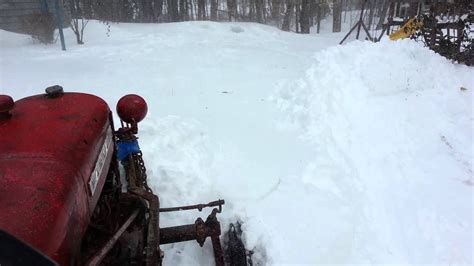 farmall cub plowing   snow  ma youtube