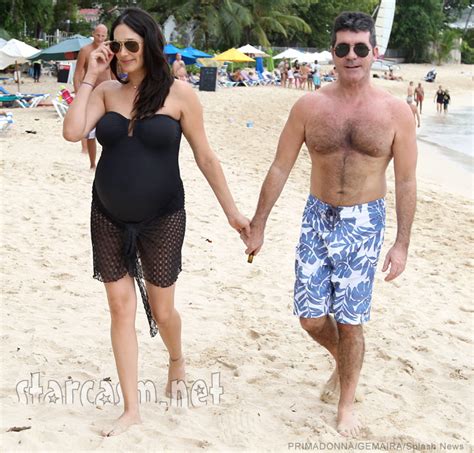 photos lauren silverman pregnant in a swimsuit with simon cowell in barbados