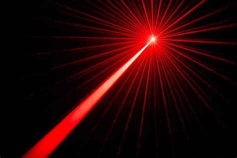 red laser beams light effect  black background photo launch