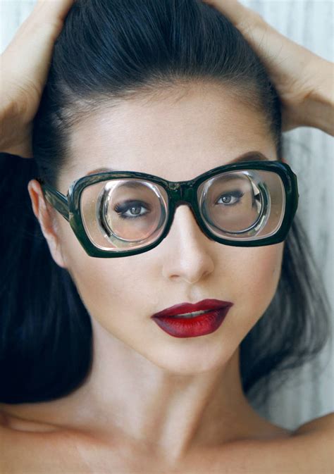dark haired girl with strong glasses by bobbylaurel on