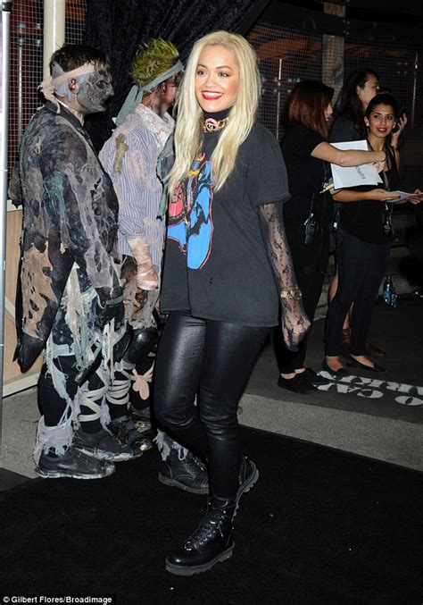 Rita Ora Cosies Up To Ghouls As Travis Barker Hits The