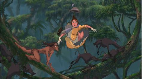 jane falls in the air as tarzan catches her in the baboon chase