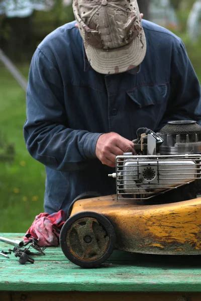 lawn mower repair stock  royalty  lawn mower repair images