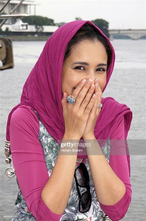 modern arab woman wearing hijab laughing dc usa photo getty images
