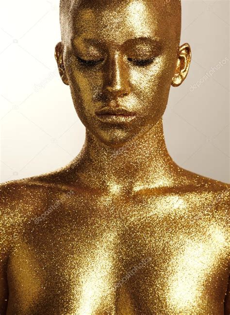 woman  gold skin stock photo  ckazzakova