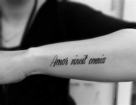 amor vincit omnia tattoo done by amir tatuaggi artistici