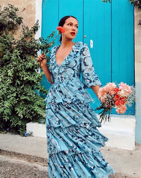 blue floral v neck long sleeved tiered ruffle maxi dress comino couture