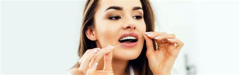 improve your brushing and flossing with these tips